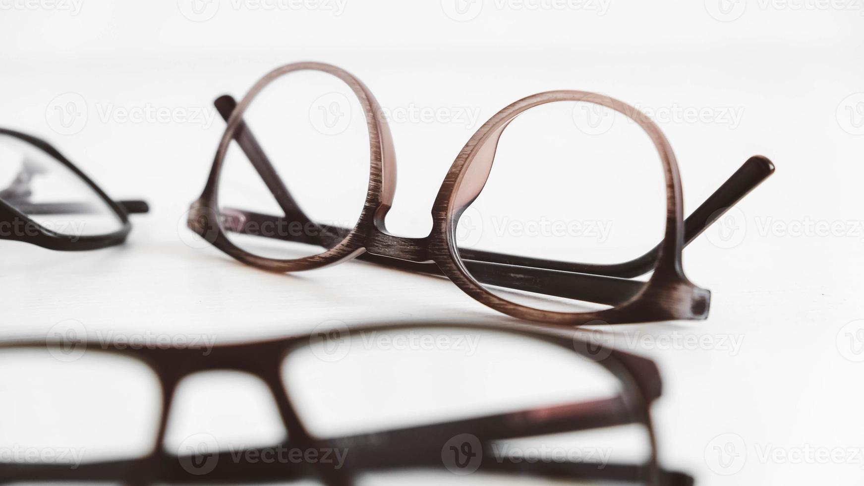 Three optical glasses of different shapes on a white background photo