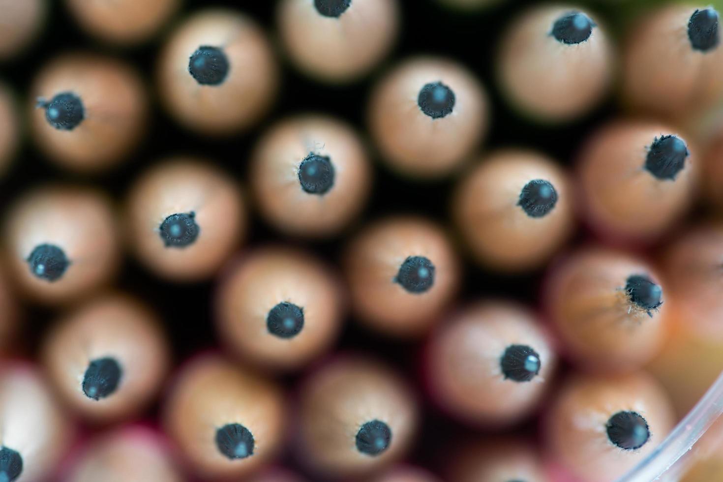 Close up front image of stacked pencils tip.shallow focus effect. photo
