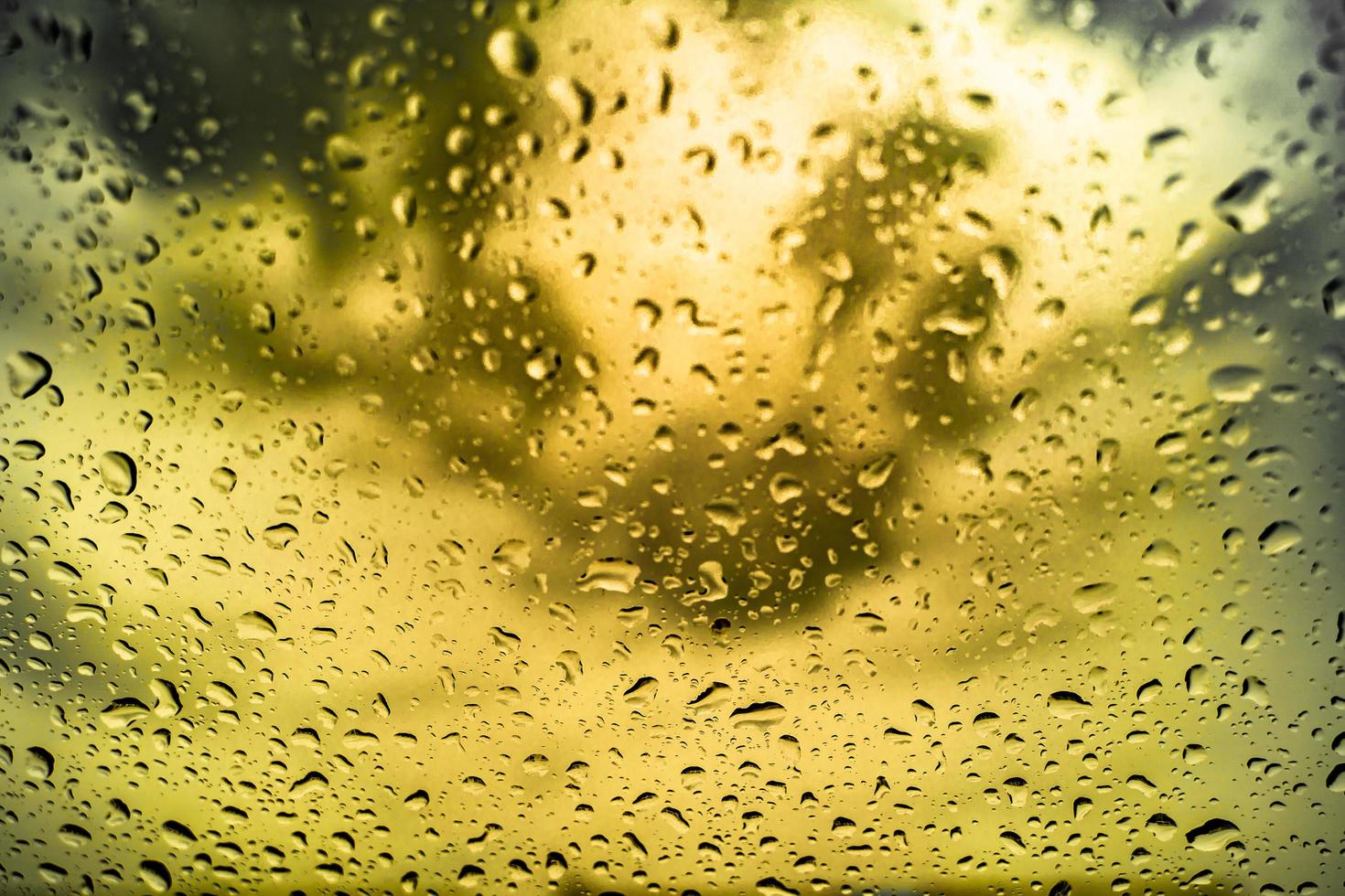 Rain drops on the windshield In the evening when heavy rain.shallow focus effect. photo