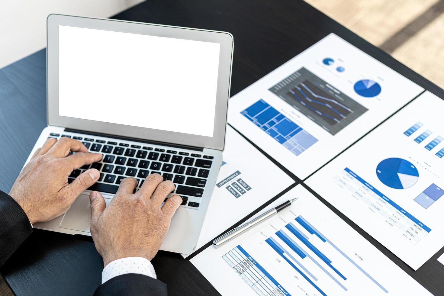 Person typing on laptop keyboard, on laptop screen blank white background for illustration, mockup screen for further editing can be used for a variety of tasks. copy space. photo