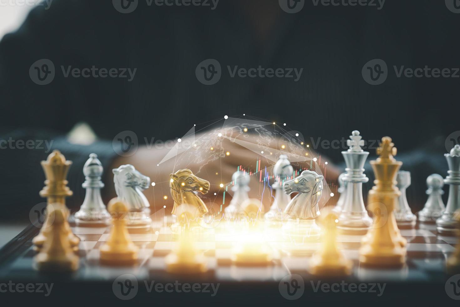 Close-up of a game of chessboard with chess pieces. Chessboard Concept vs. Business Management on Risk, Graphic Charts Showing Financial Flows and Business Performance. Risk management. photo