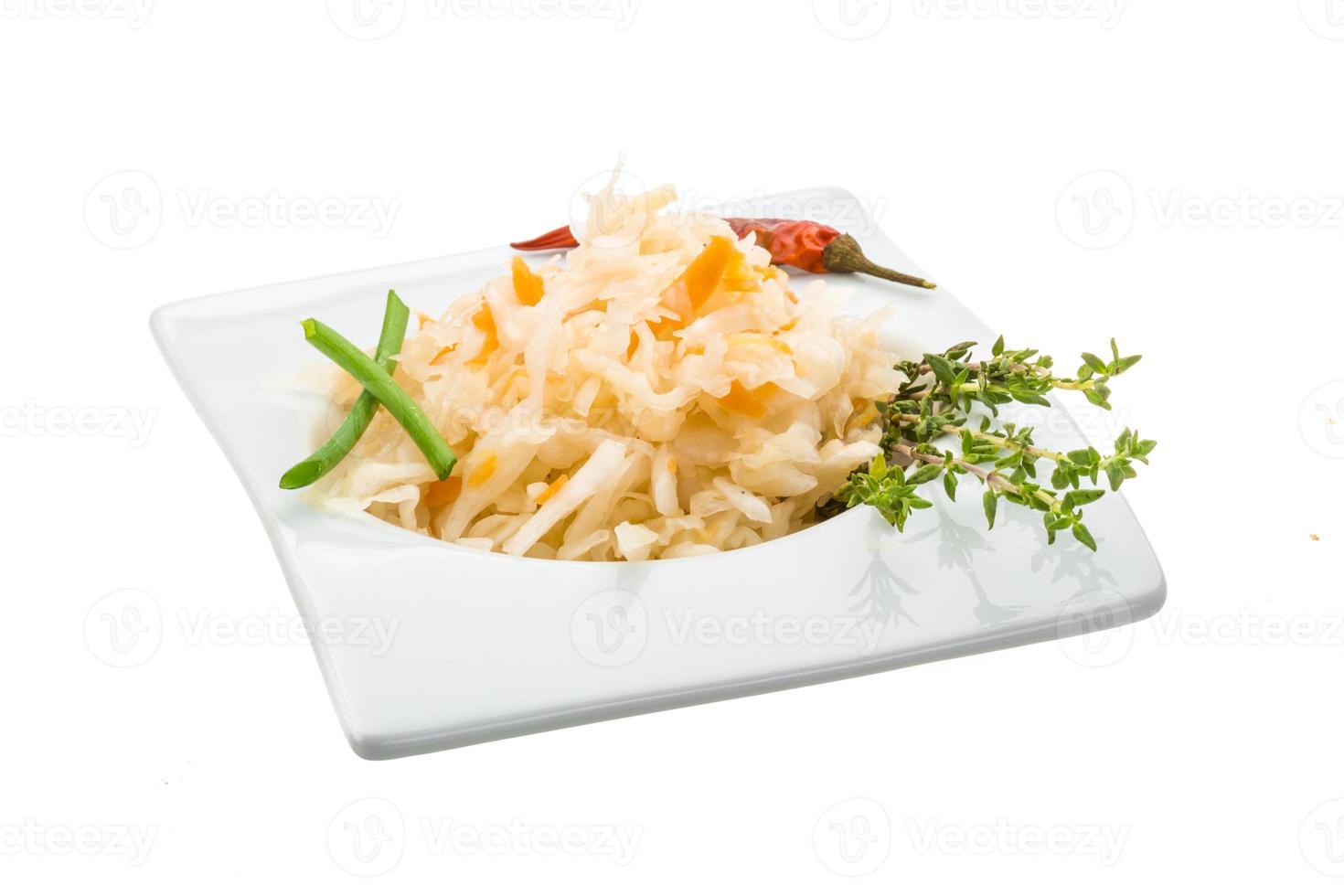 Fermented cabbage in dish photo