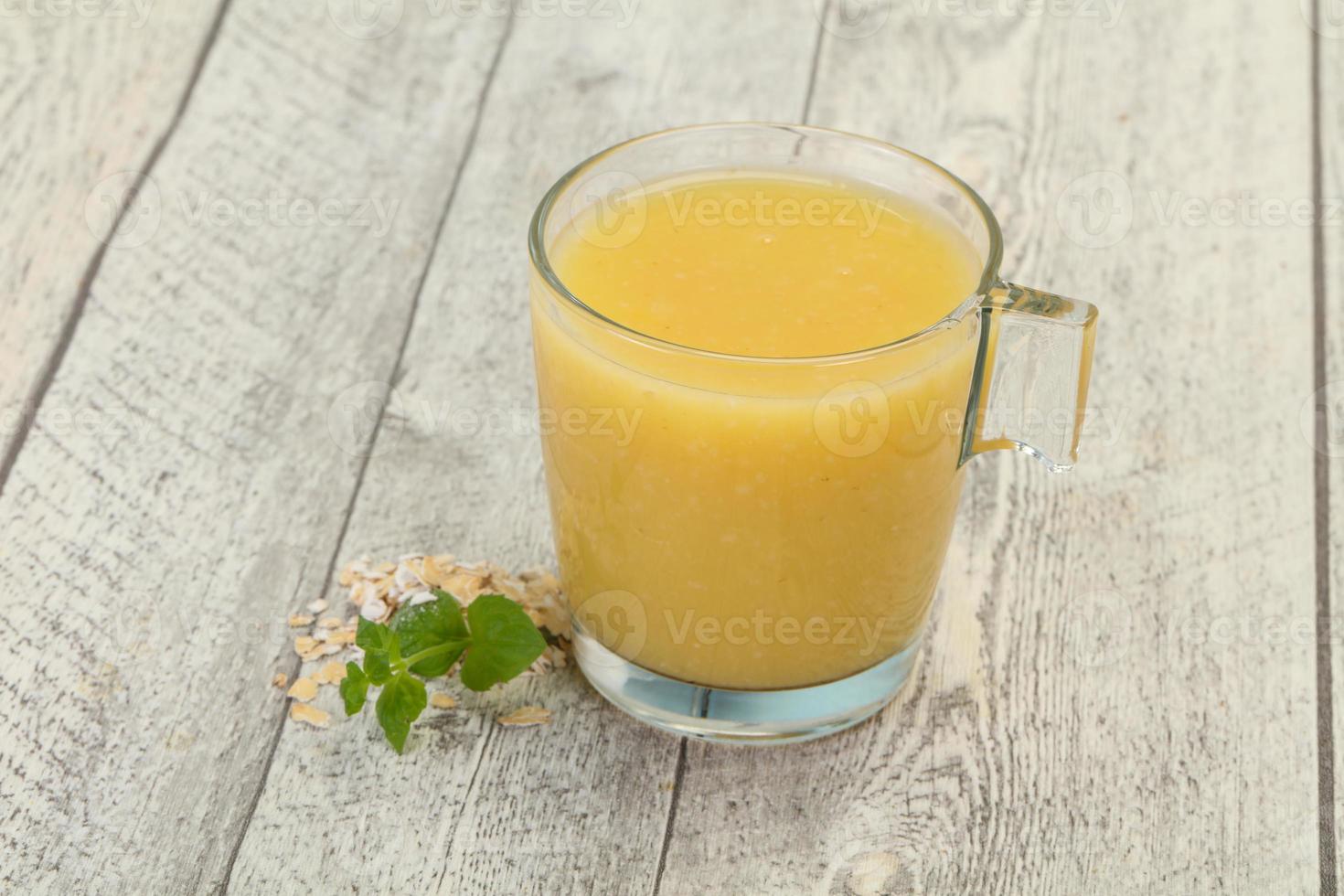 Dietary vegetarian oats milk over wooden photo