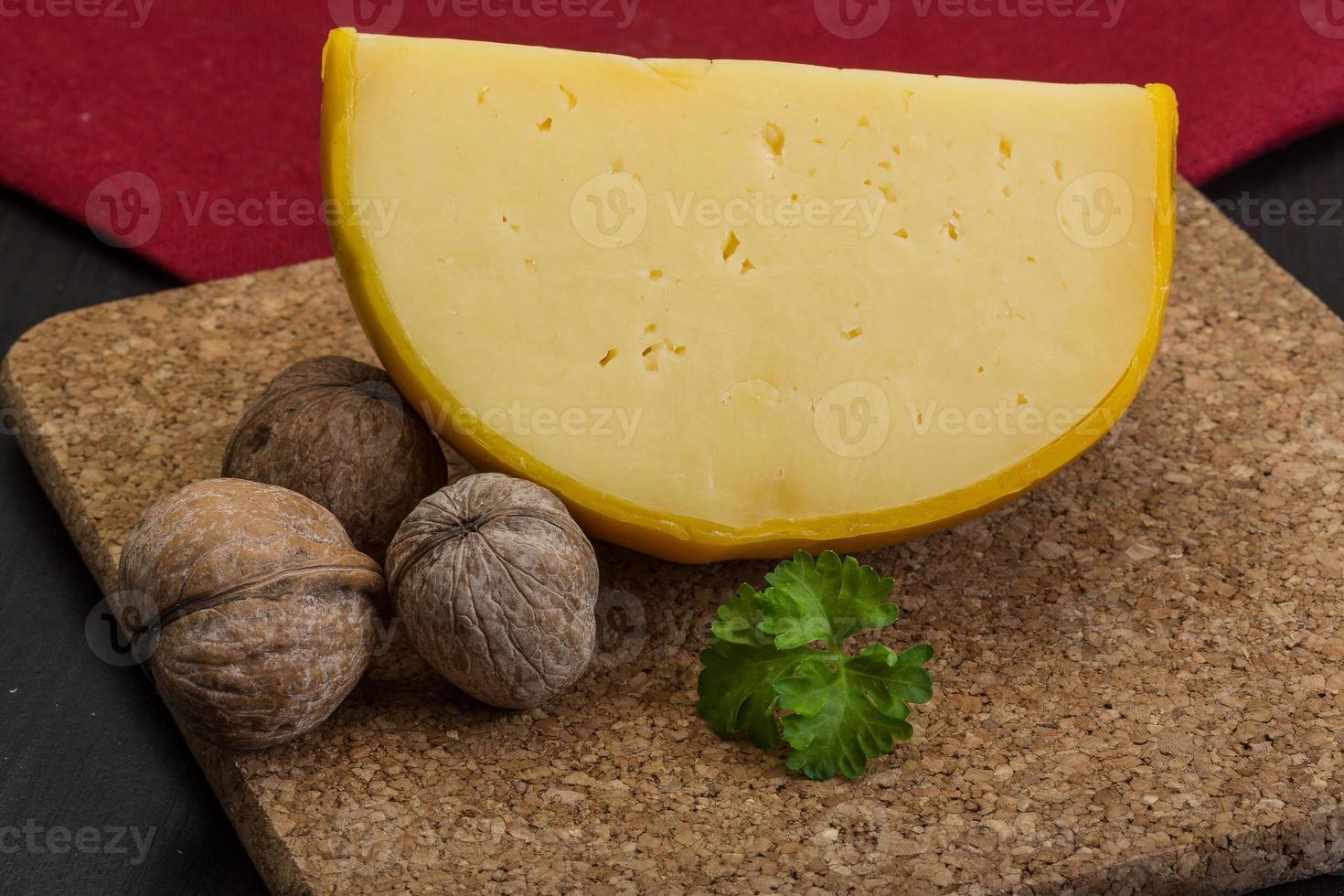 Yellow round cheese photo