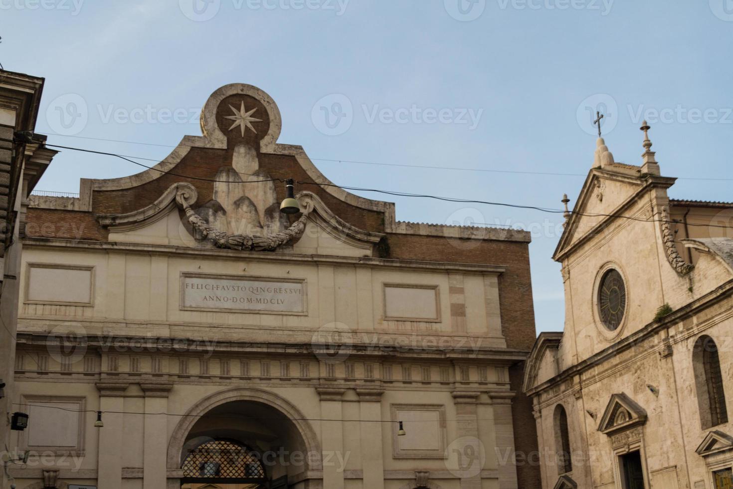 Rome, Italy. Famous Porta del Popolo city gate. photo