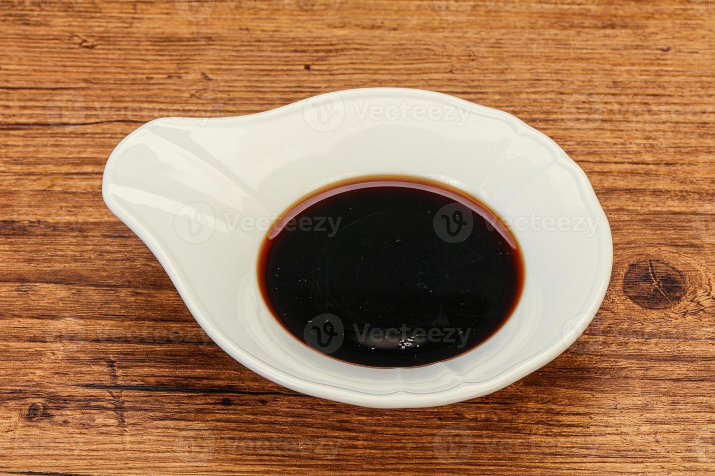 Asian soya sauce in the bowl photo