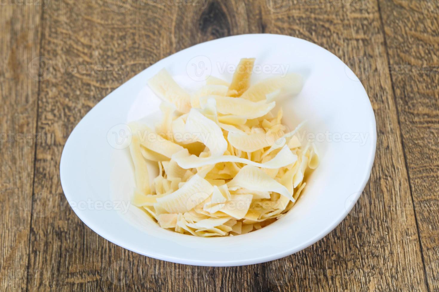 Coconut dry chips in the bowl photo