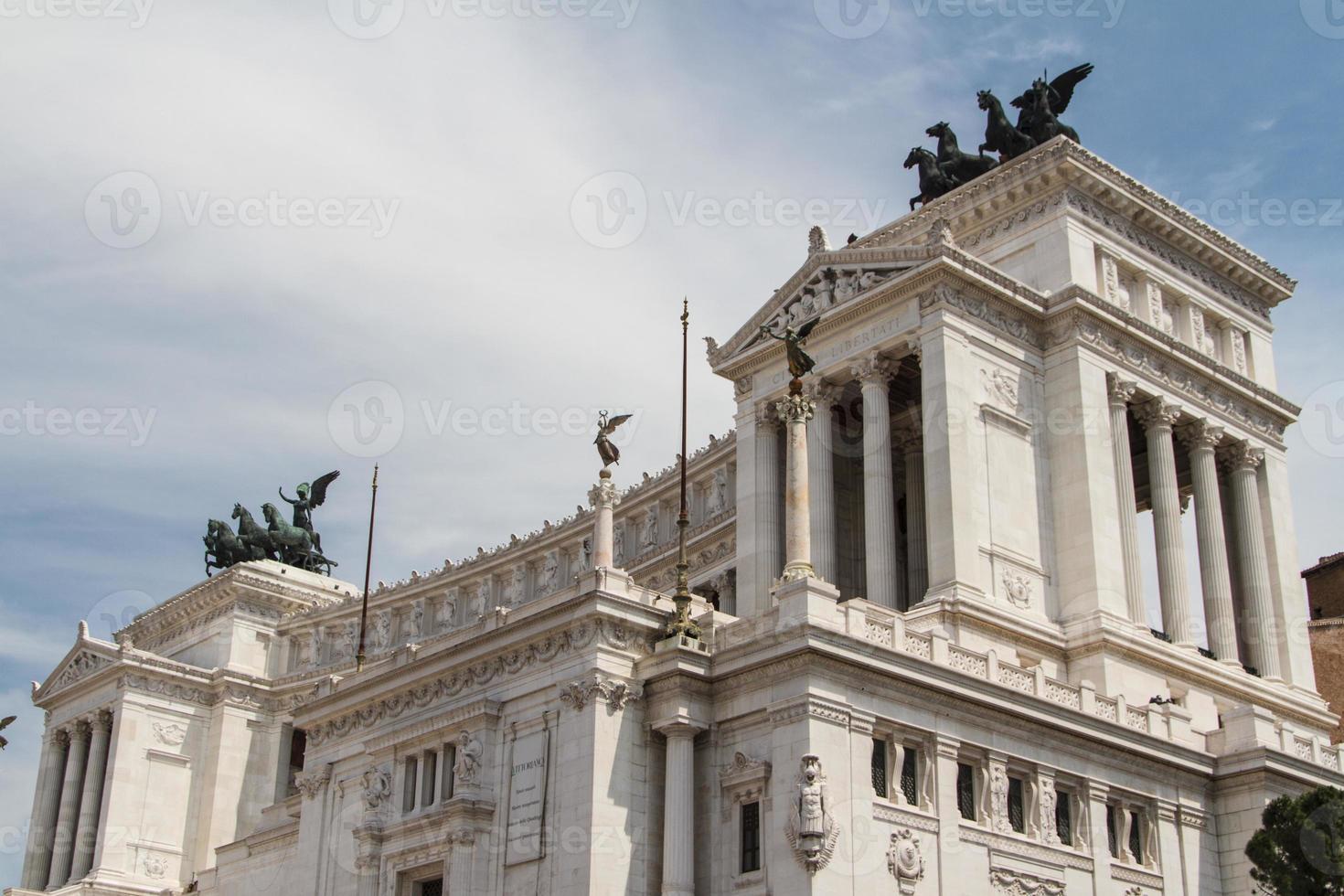 Equestrian monument to Victor Emmanuel II near Vittoriano at day in Rome, Italy photo