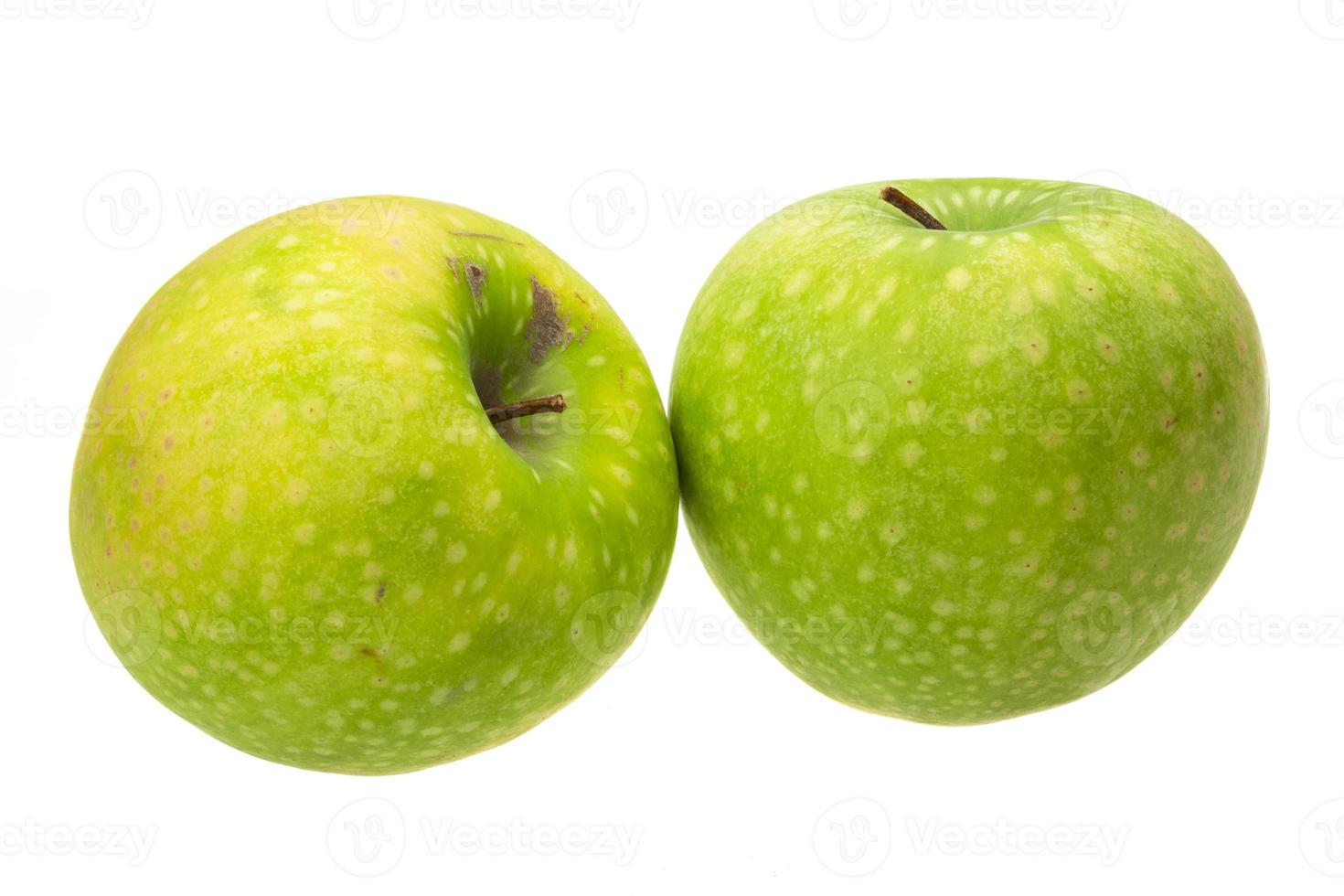 Green apple on white photo
