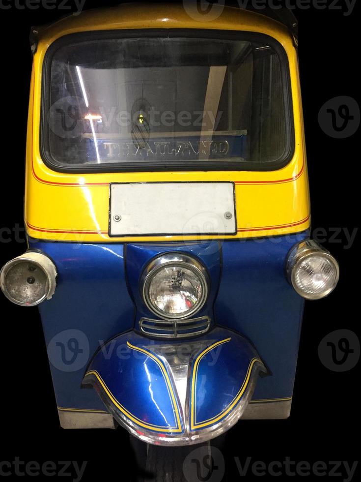 front view of an auto rickshaw called a tuk-tuk used commonly as a form of transport in South East Asia photo