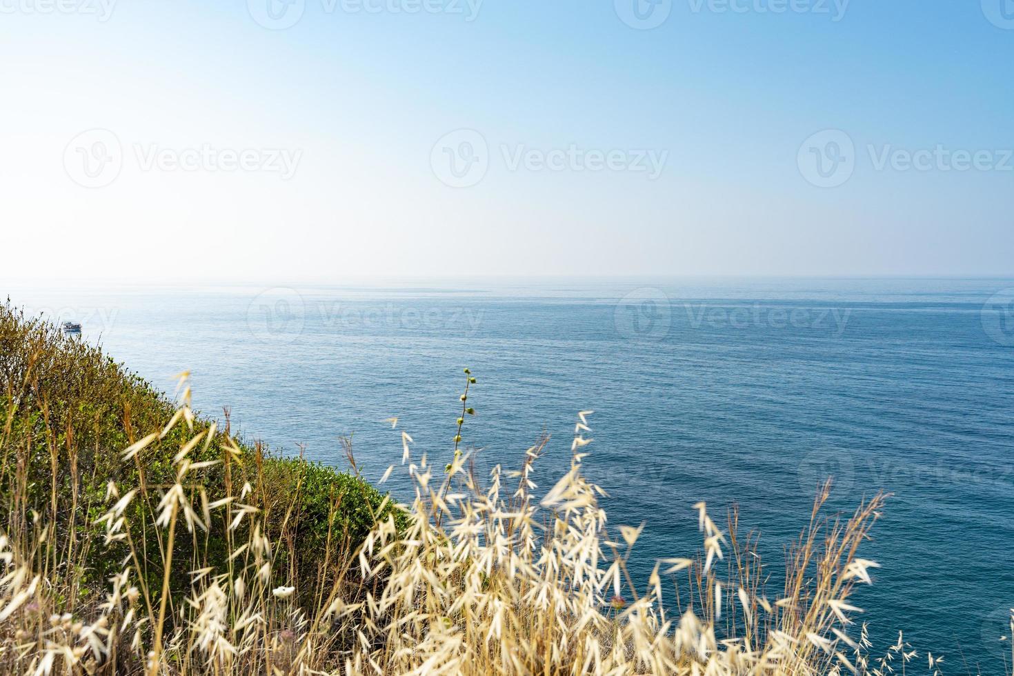 The coast and beaches of Turkey Alanya. Landscape of the seashore from a height. Vacation on the beach in Turkey photo