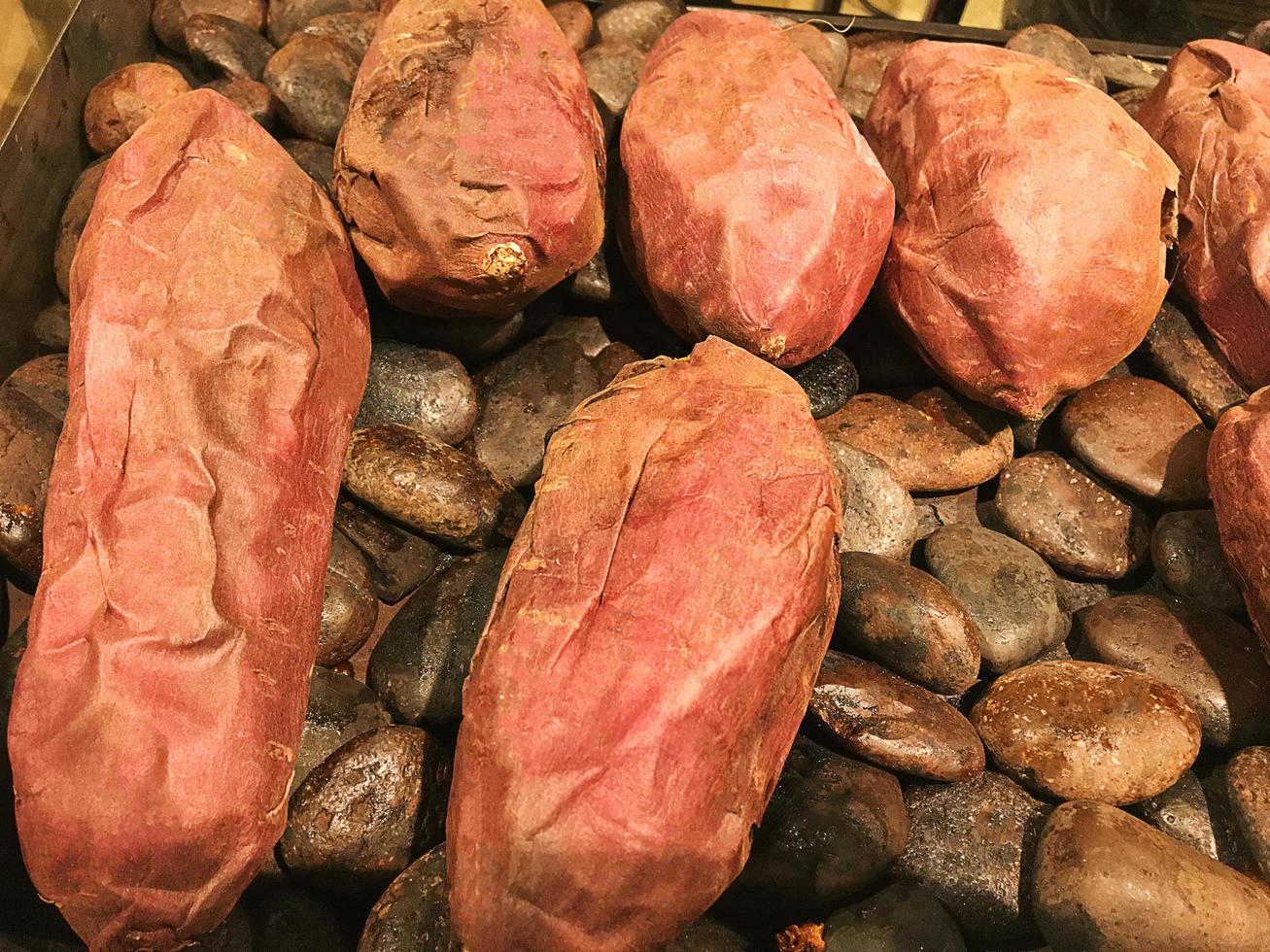 Organic Yams Sweet Potatoes with rock. photo
