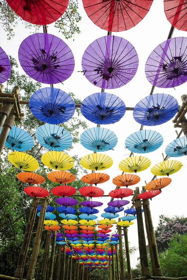 Colorful umbrellas in the park. photo