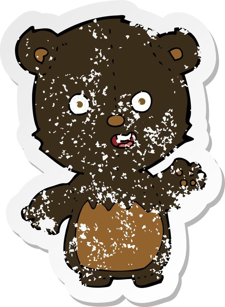 retro distressed sticker of a cartoon waving black bear cub vector