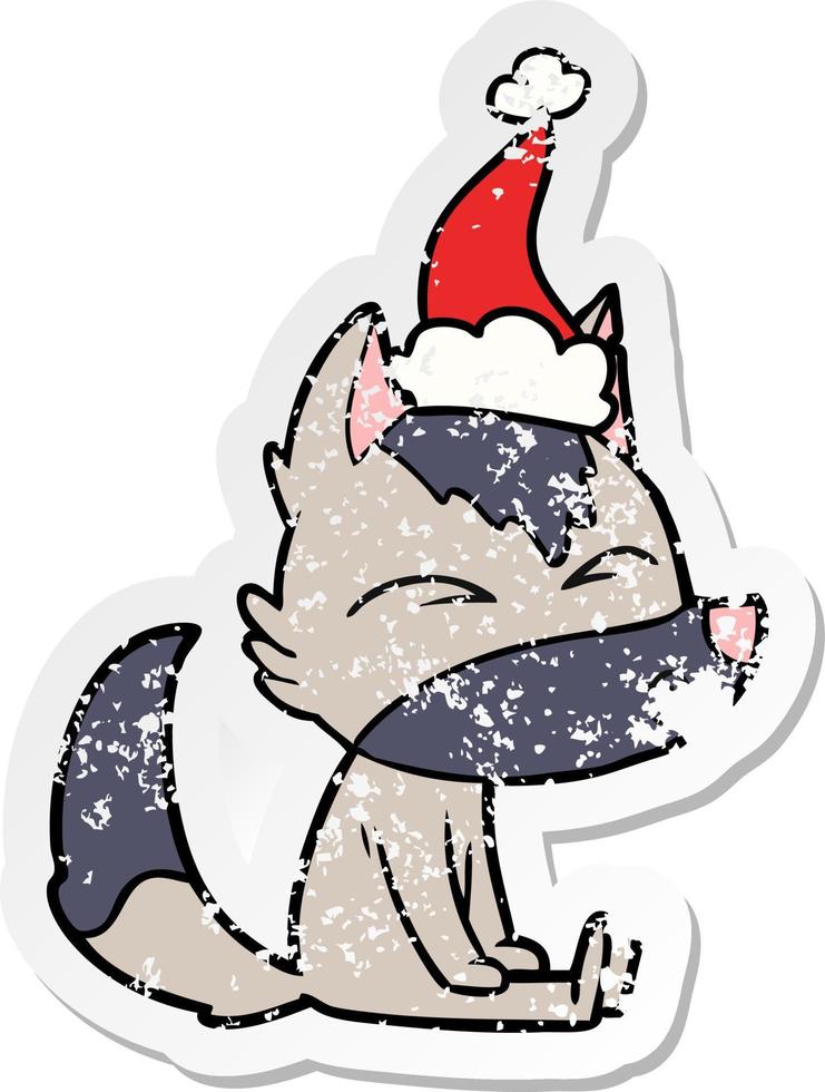 distressed sticker cartoon of a wolf whistling wearing santa hat vector
