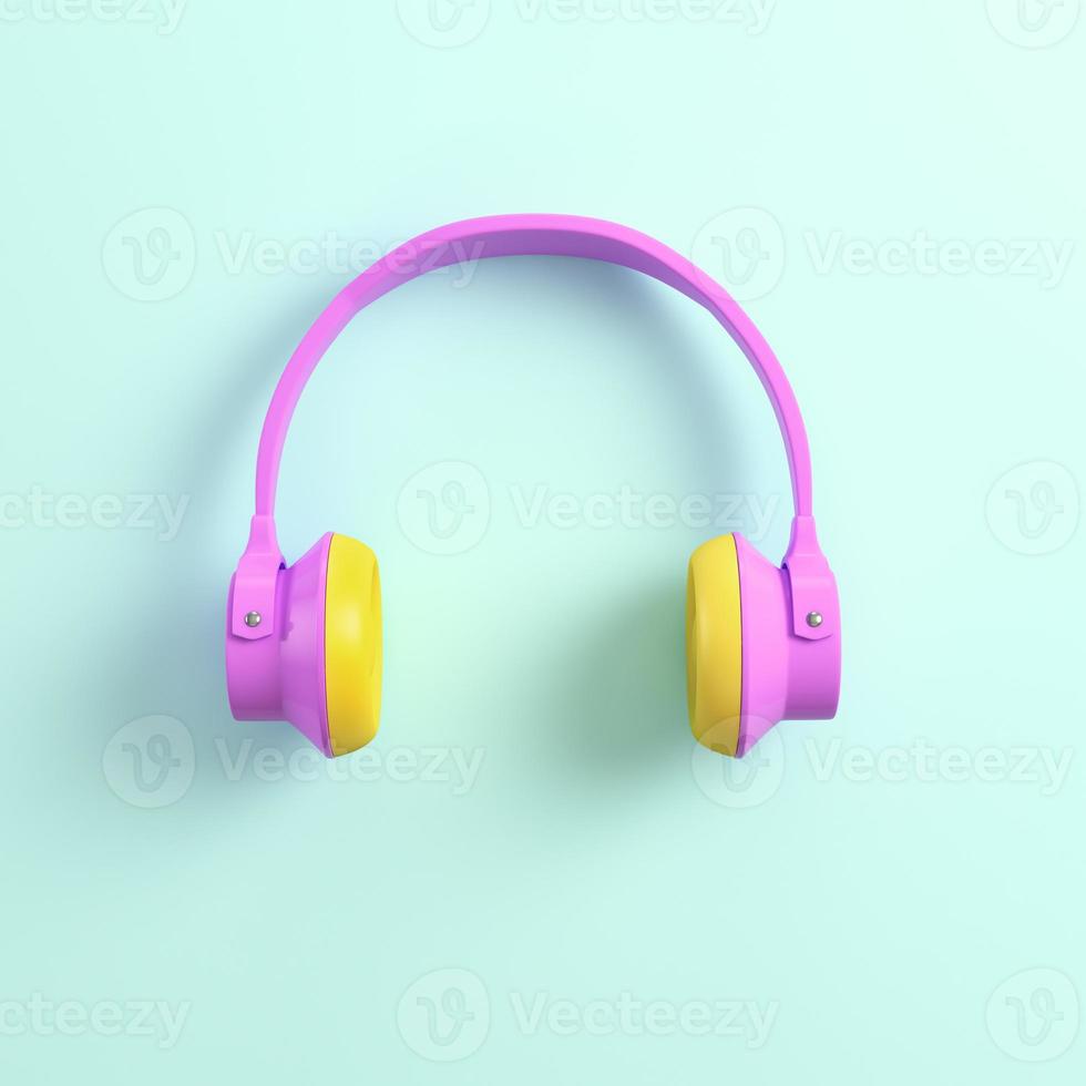 Pink headphones on bright background photo