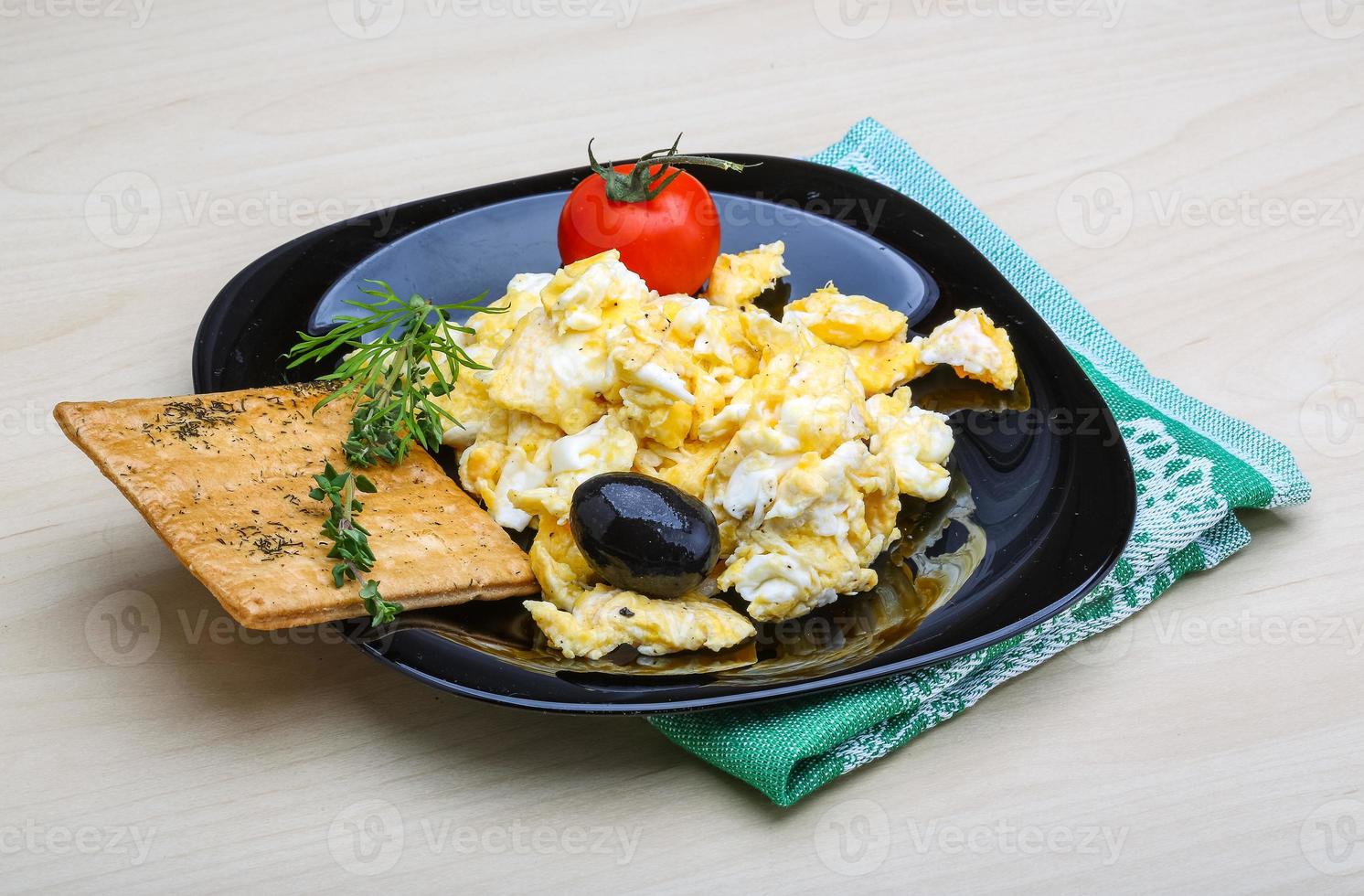 Scrambled eggs with tomato photo