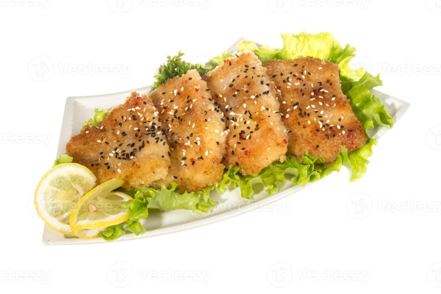 Roasted fish with lemon photo