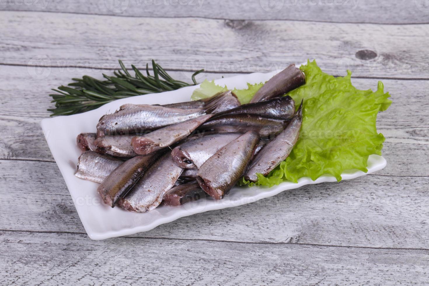 Anchovy fish snack in the bowl photo