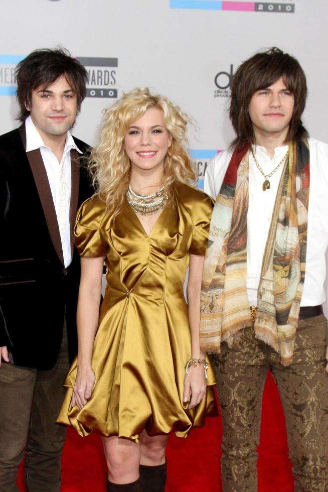 LOS ANGELES  NOV 21 - The Band Perry  Reid Perry, Kimberly Perry, Neil Perry arrives at the 2010 American Music Awards at Nokia Theater on November 21, 2010 in Los Angeles, CA photo