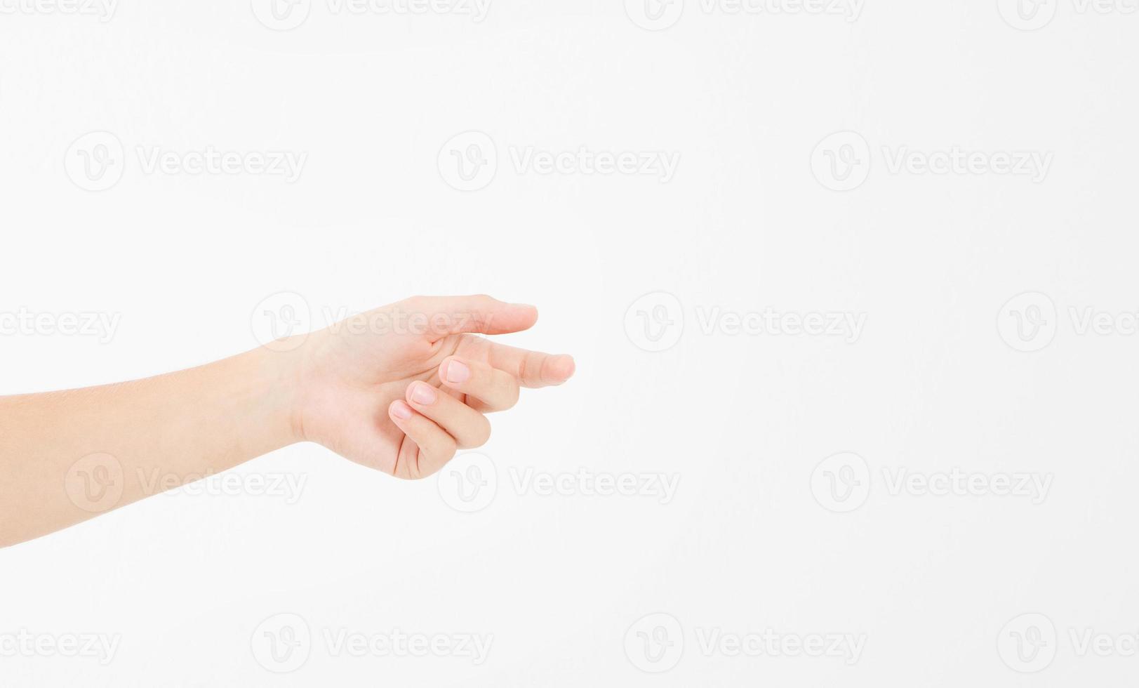female hand holding invisible items, woman's palm making gesture while showing small amount of something on white isolated background, side view, close-up, cutout, copy space photo