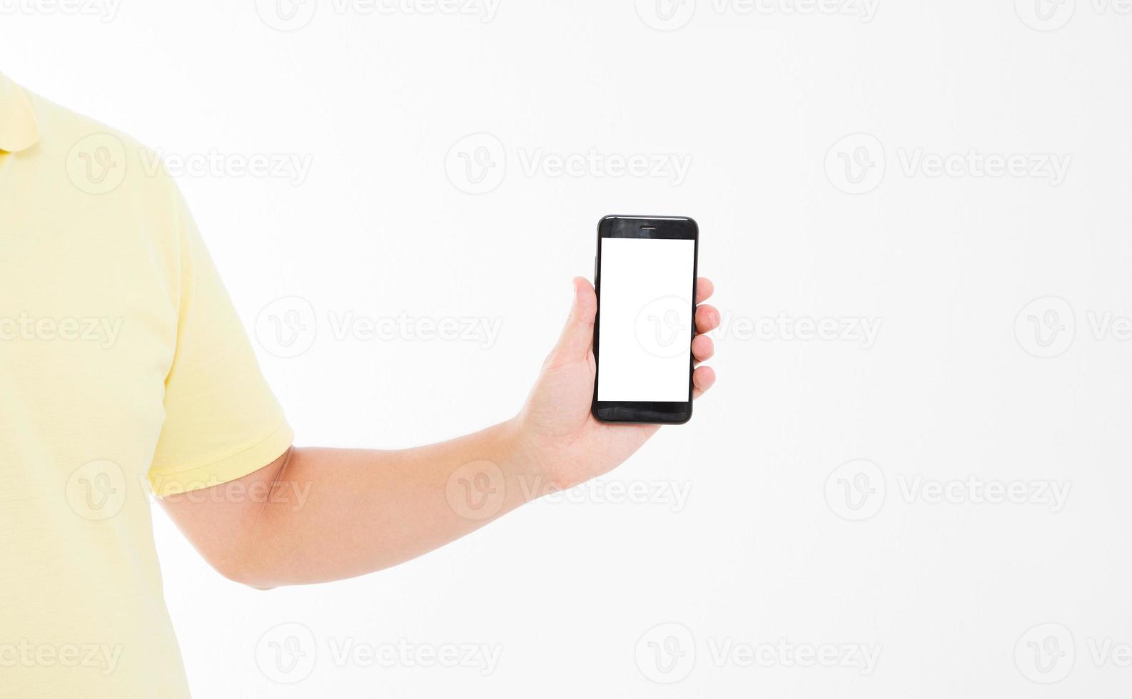 Hand holding black phone isolated on white clipping path inside. Top view.Mock up.Copy space.Template.Blank. photo