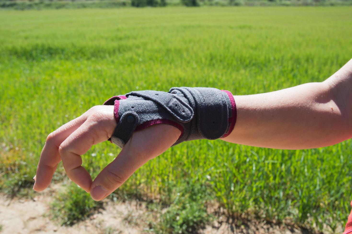 Hand of a caucasian woman wearing a resting splint to protect her injured hand. Madrid photo