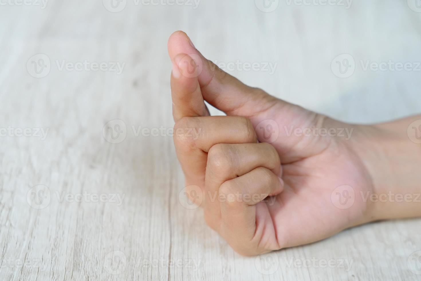 Asian woman's hand gestures are isolated over white background photo