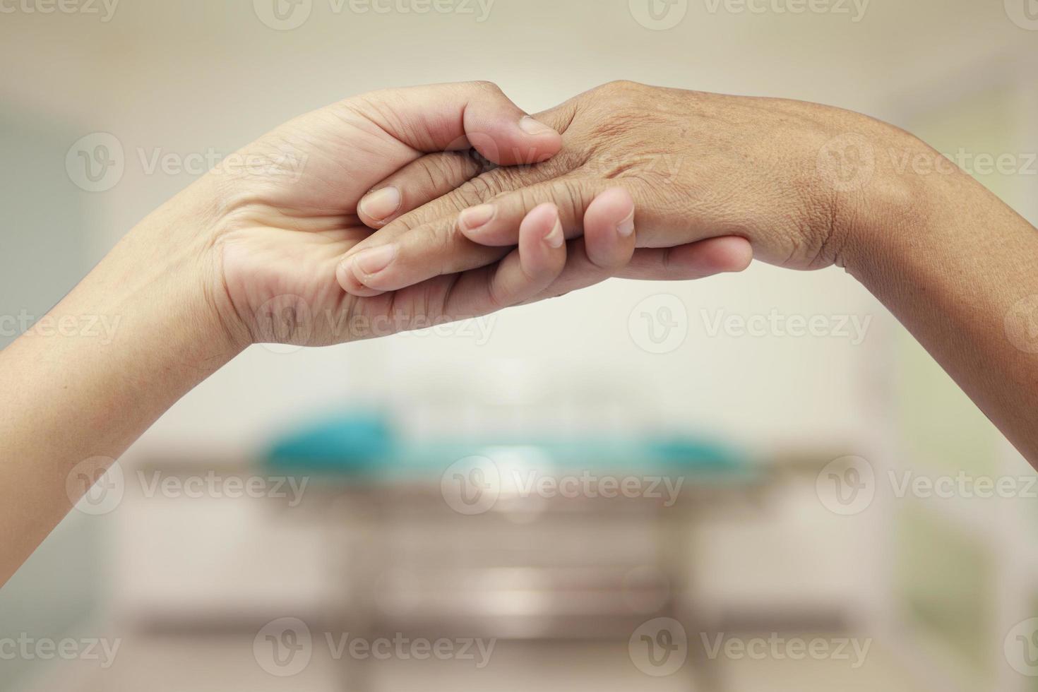 Holding senior hand photo