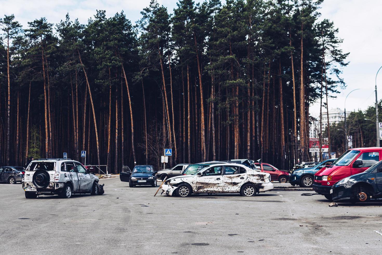 Irpin, Kyiv region, Ukraine - 28 April 2022.  Car graveyard in Irpin, consequences of the invasion of the Russian army in Ukraine. photo