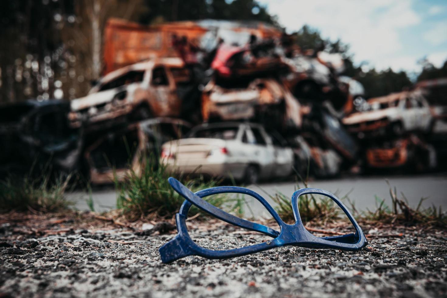 Irpin, Kyiv region, Ukraine - 28 April 2022.  Car graveyard in Irpin, consequences of the invasion of the Russian army in Ukraine. photo