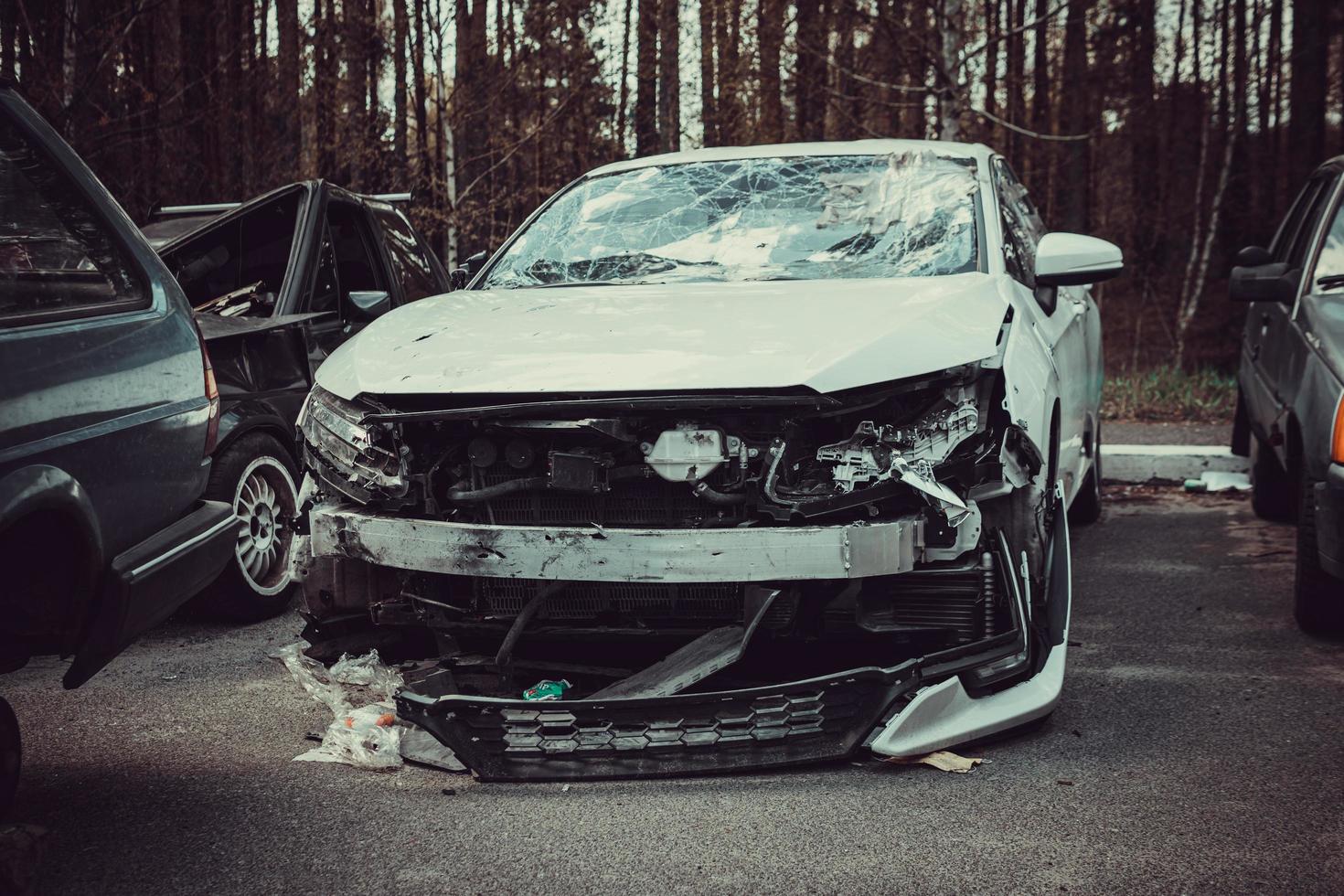 Irpin, Kyiv region, Ukraine - 28 April 2022.  Car graveyard in Irpin, consequences of the invasion of the Russian army in Ukraine. photo