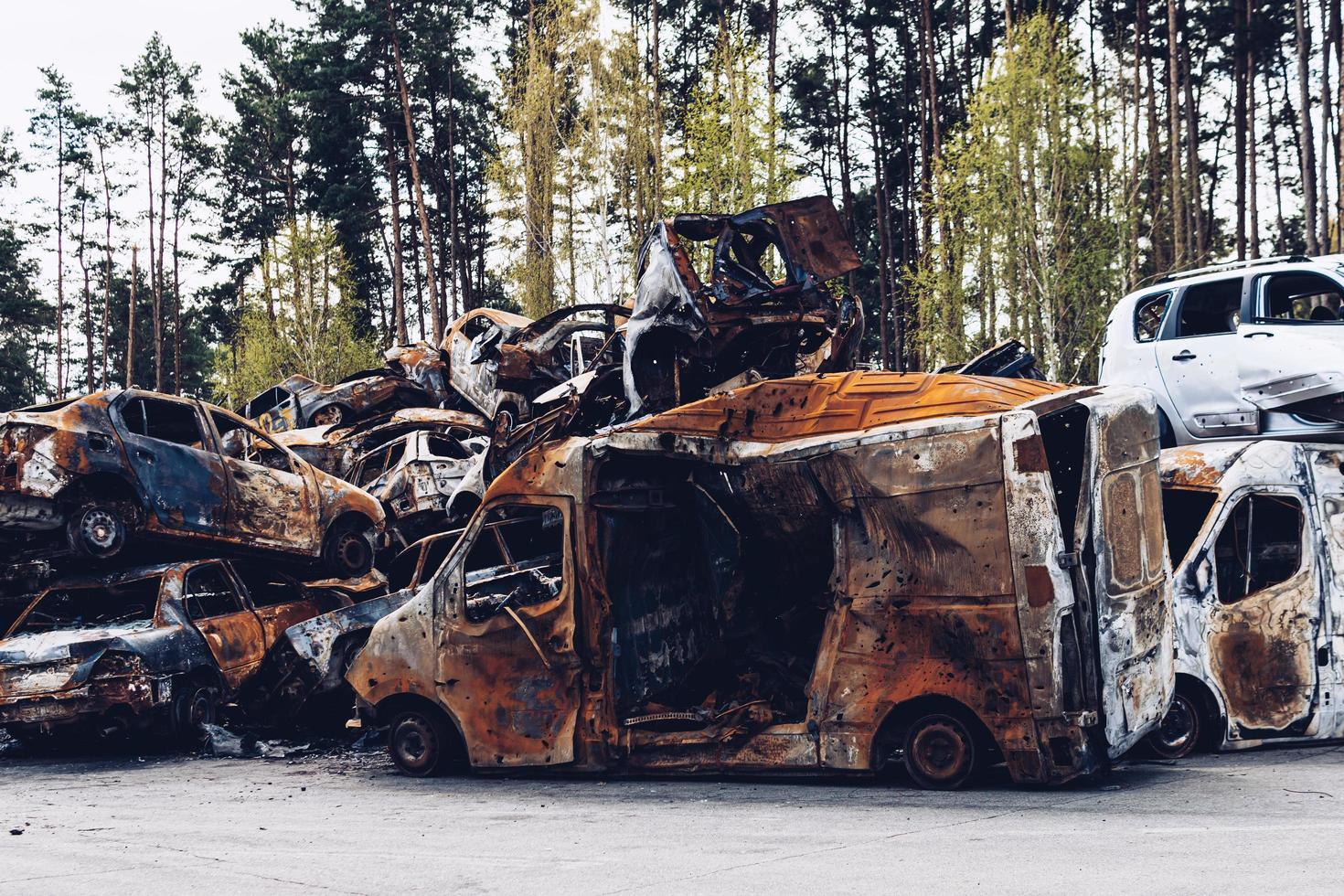 Irpin, Kyiv region, Ukraine - 28 April 2022.  Car graveyard in Irpin, consequences of the invasion of the Russian army in Ukraine. photo