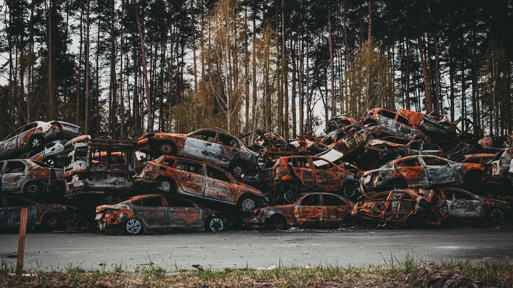 Irpin, Kyiv region, Ukraine - 28 April 2022.  Car graveyard in Irpin, consequences of the invasion of the Russian army in Ukraine. photo