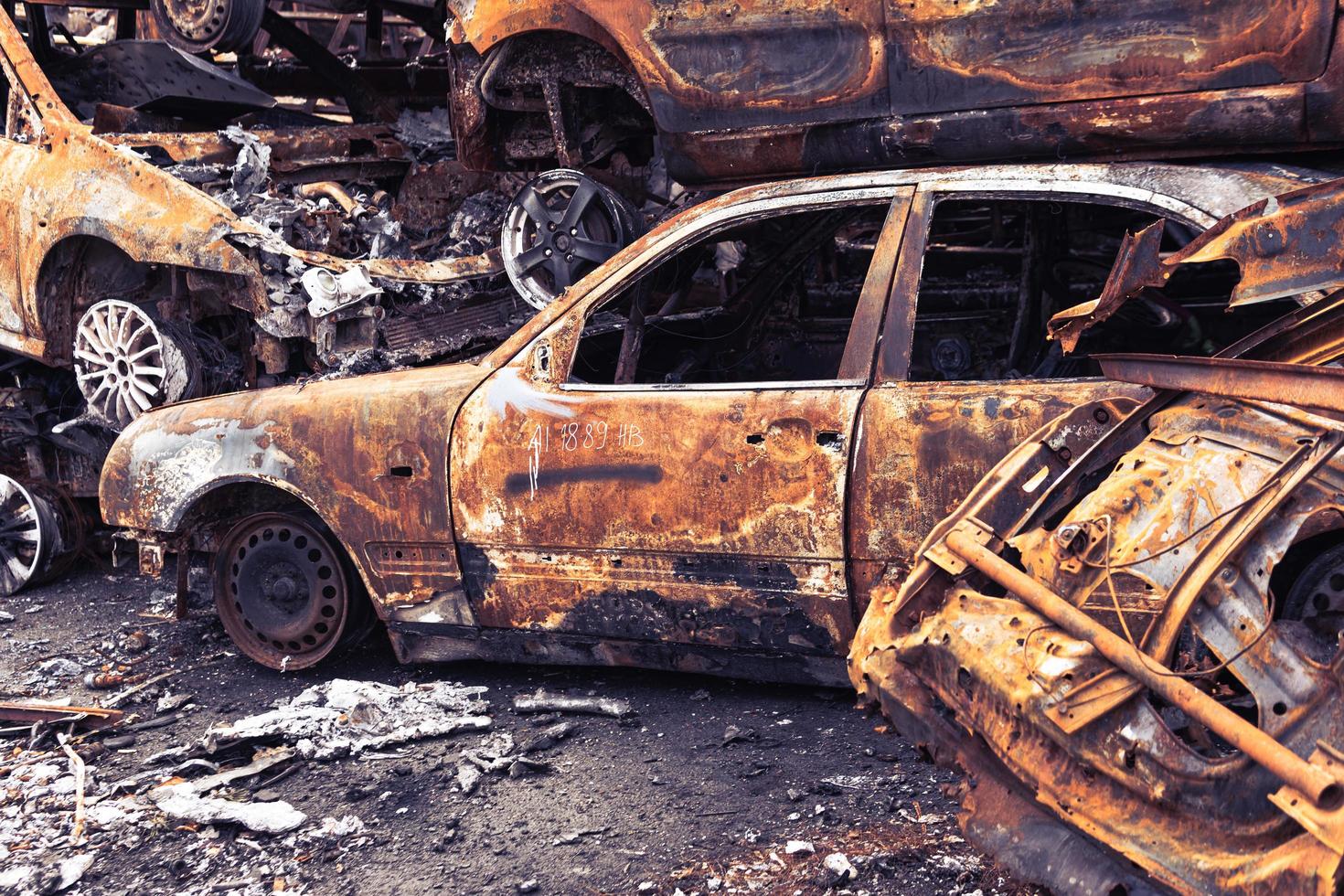 Irpin, Kyiv region, Ukraine - 28 April 2022.  Car graveyard in Irpin, consequences of the invasion of the Russian army in Ukraine. photo