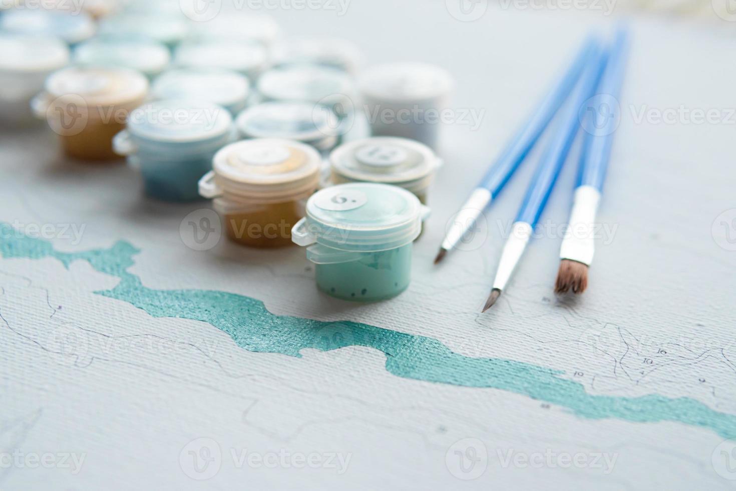 A set of colorful gouache for painting by numbers, drawing on canvas. photo