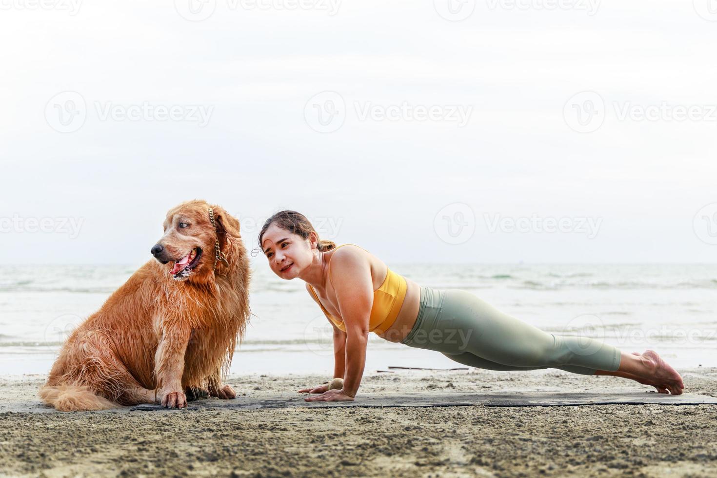 Yoga exercises with cute dog concept. Healthy active lifestyle concept. Relaxation with a pet. photo