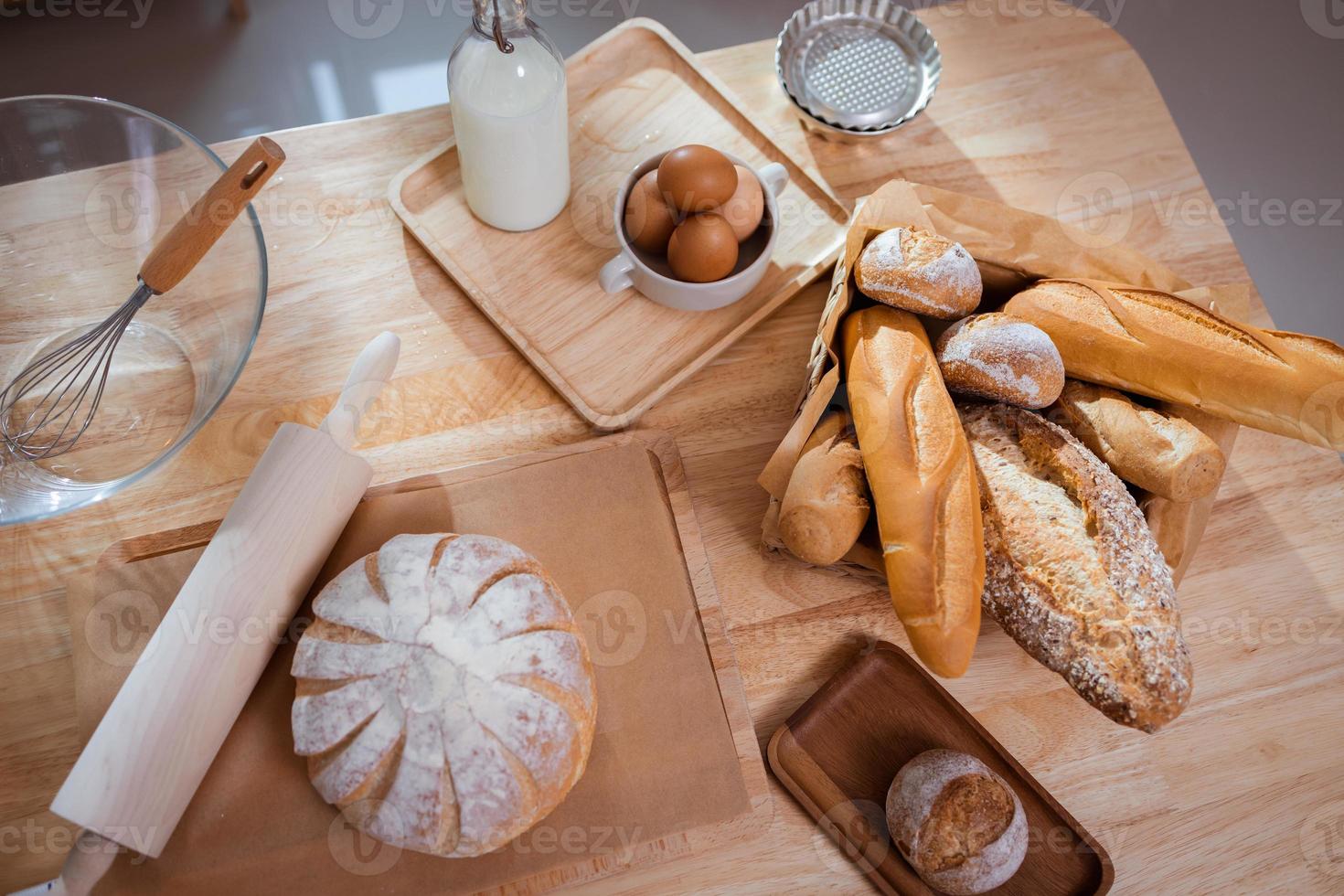 Fresh homemade bread on a table in the kitchen. Bakery baker bread