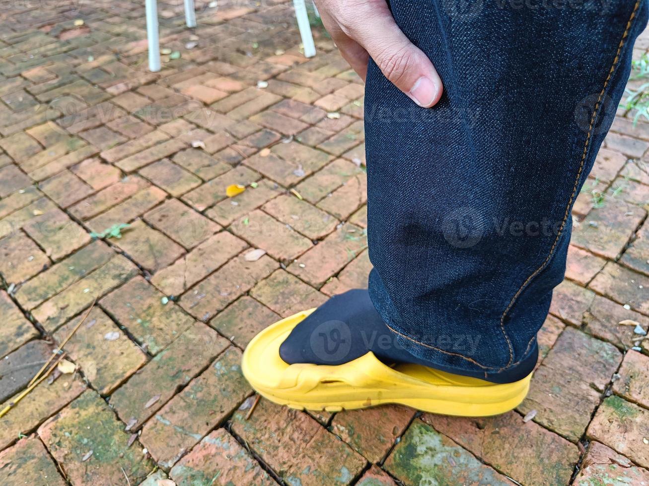 unhappy man suffering from leg ache. chronic disease photo