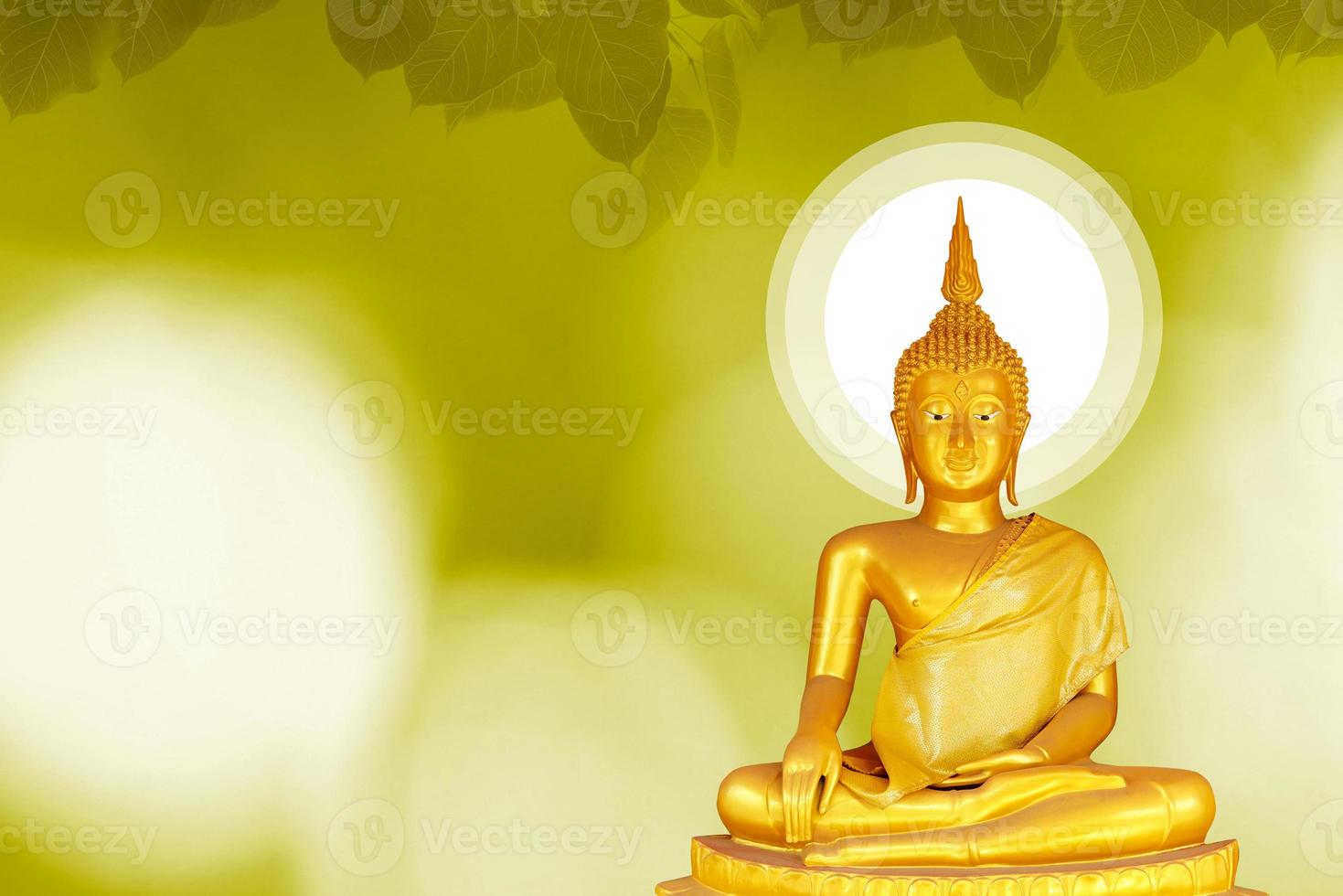 Makha Asanaha Visakha Bucha Day Golden Buddha image. Background of Bodhi leaves with shining light. Soft image and smooth focus style photo