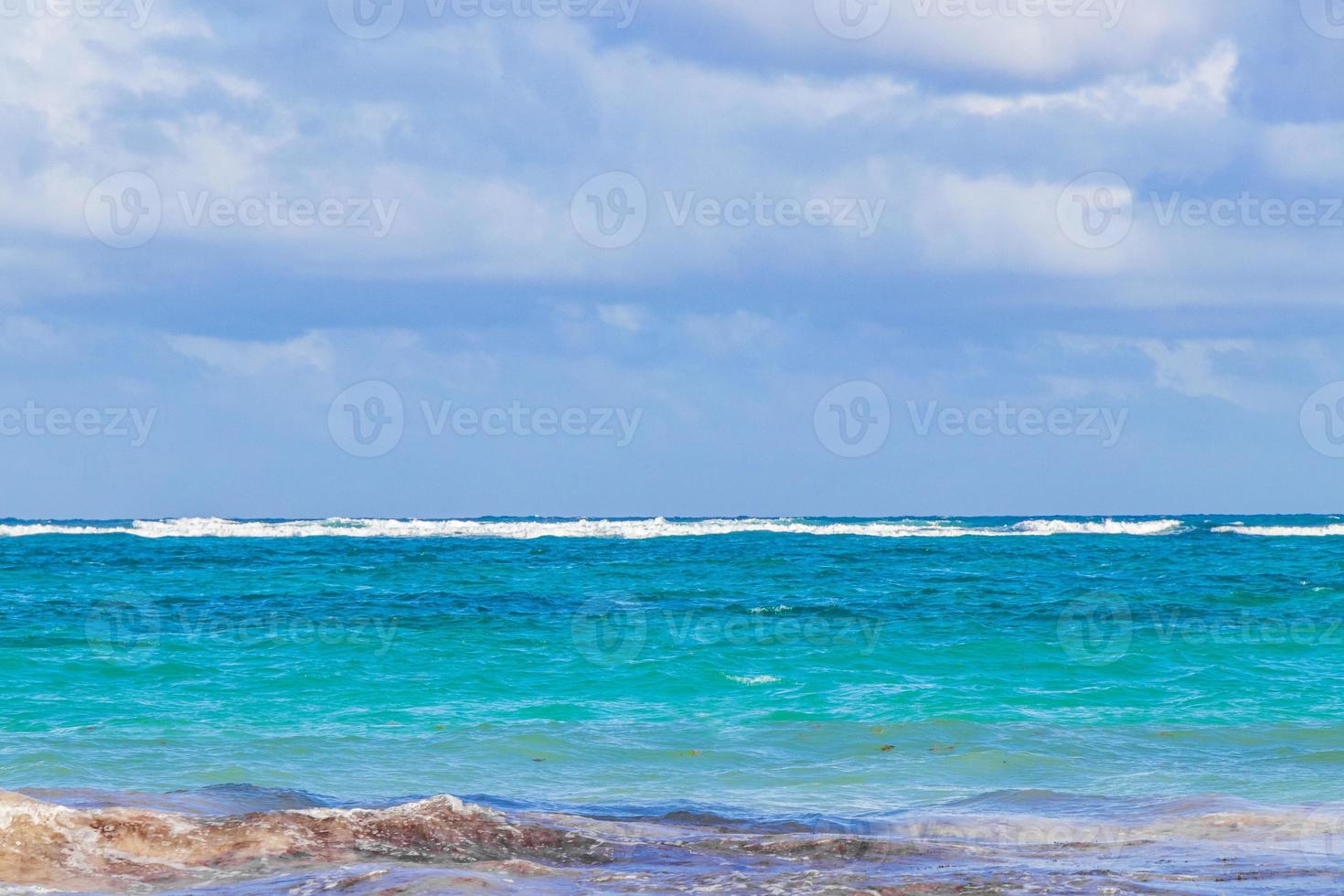 Waves water caribbean coast and beach panorama view Tulum Mexico. photo