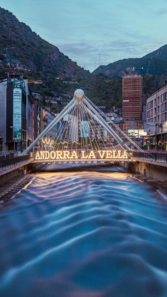 Andorra la Vella,Andorra . 2022 May 12 .  Pont de Paris in the background and the work of Salvador Dali Nobleza del Tiempo in summer 2022. photo