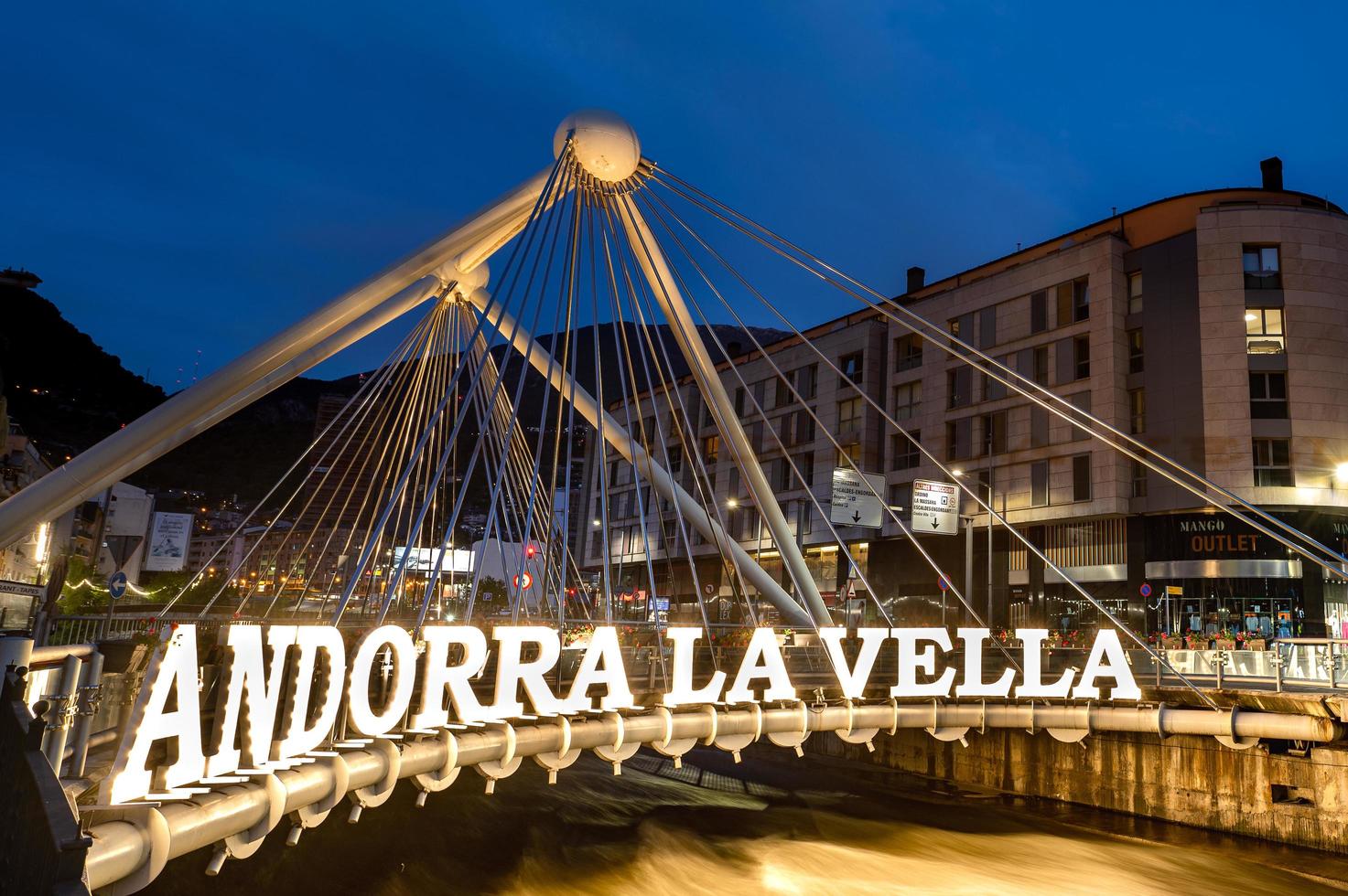 Andorra la Vella,Andorra . 2022 May 12 .  Pont de Paris in the background and the work of Salvador Dali Nobleza del Tiempo in summer 2022. photo