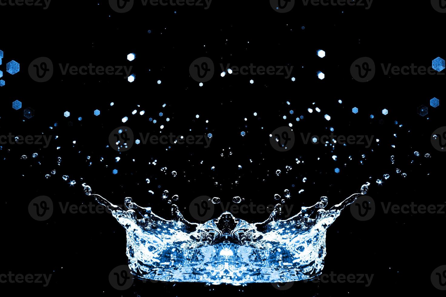 water splash isolated on the black background photo