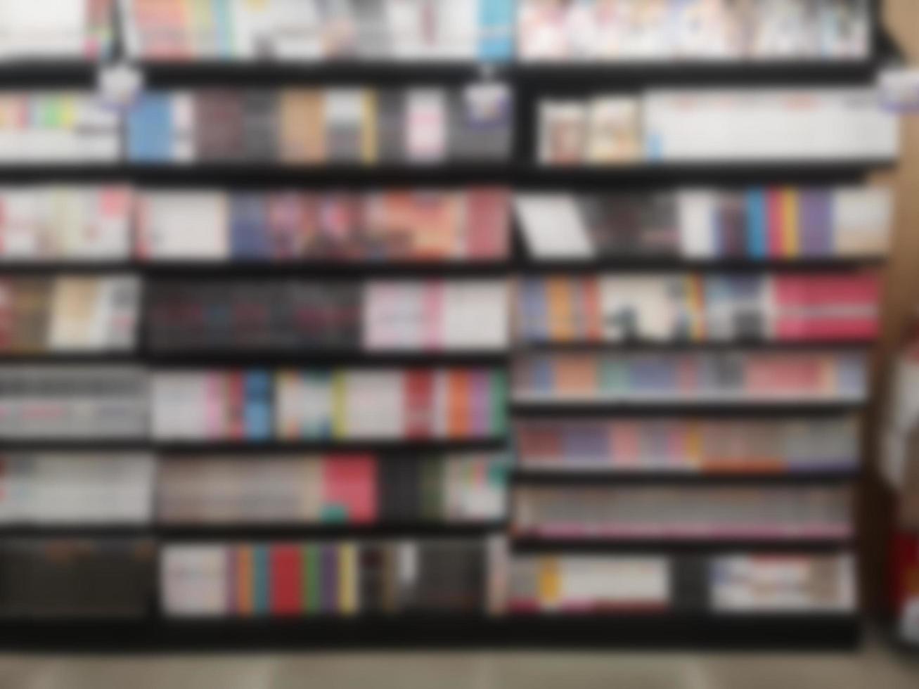 Blurred of Books arranged on shelves, bookshelf in the shop or library, background photo