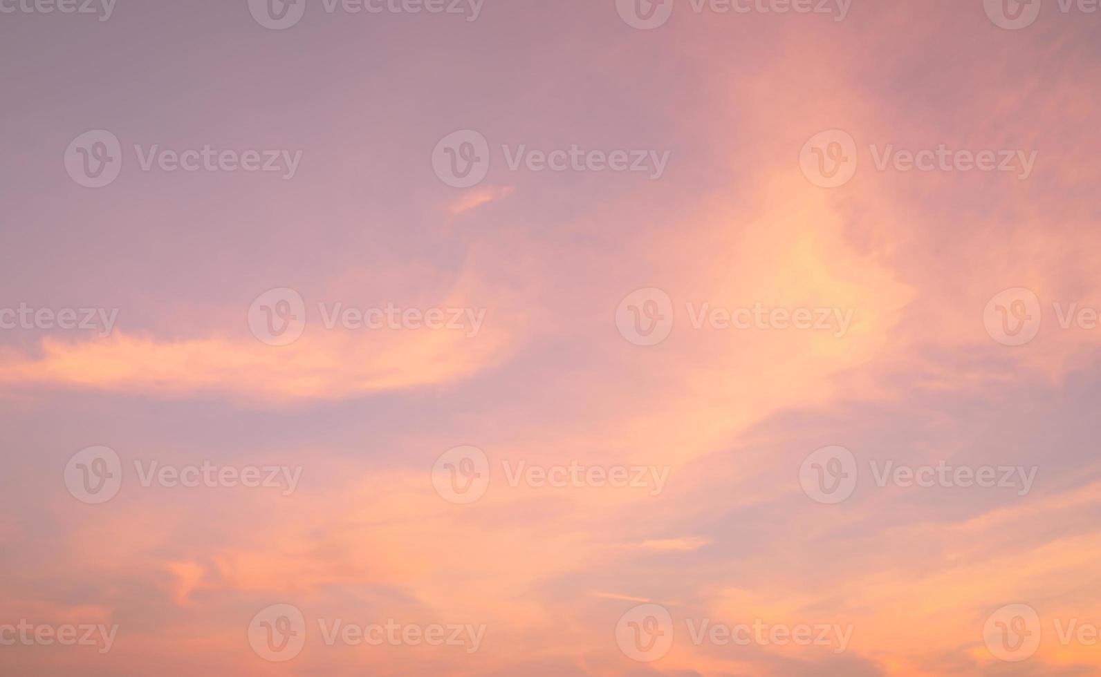 Dramatic pink sky and clouds abstract background. Art picture of pink clouds texture. Beautiful sunset sky. Sunset abstract background. Pastel color sky in the evening. Calm and relax life. photo