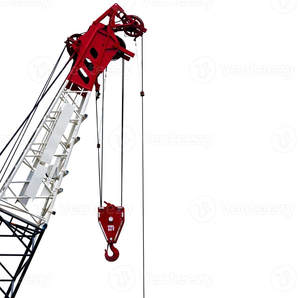 Construction crane for heavy lifting isolated on white background. Construction industry. Crane for lift with 50T safe working load. Crane for rent. Crane dealership for construction business. photo