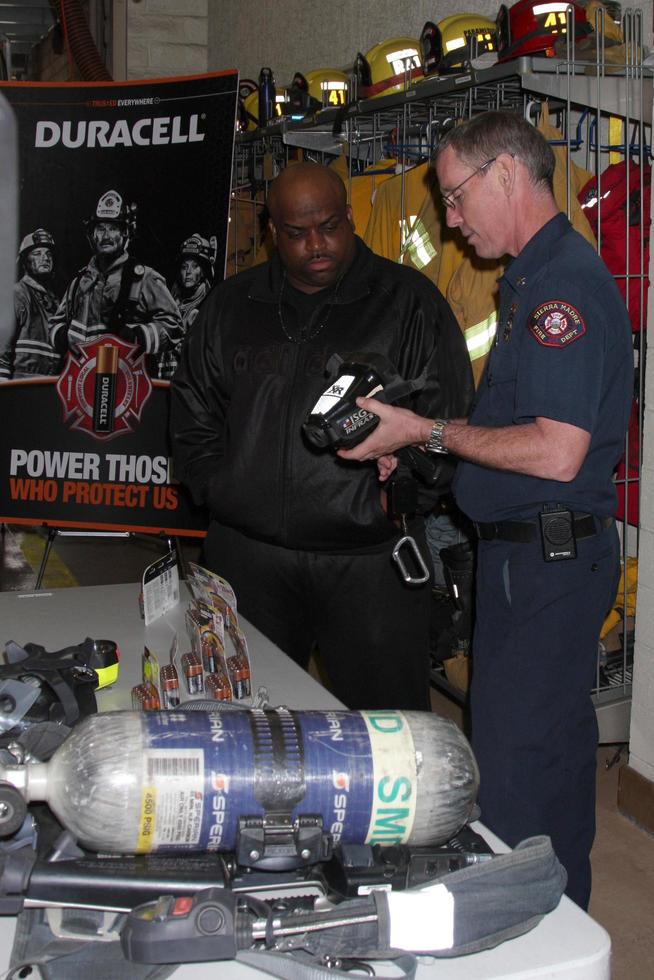 LOS ANGELES, JUN 8 - Cee Lo Green with Sierra Madra Firefighters at the Duracell, Power Those Who Protect Us Event at Sierra Madre Fire Department on June 8, 2011 in Sierra Madre, CA photo