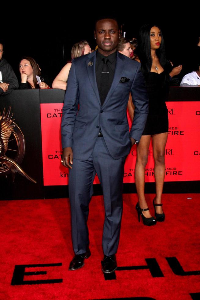 LOS ANGELES, NOV 18 - Dayo Okeniyi at the The Hunger Games - Catching Fire Premiere at Nokia Theater on November 18, 2013 in Los Angeles, CA photo