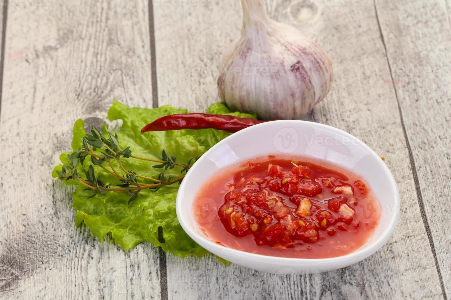 Spicy tomato and garlic sauce photo